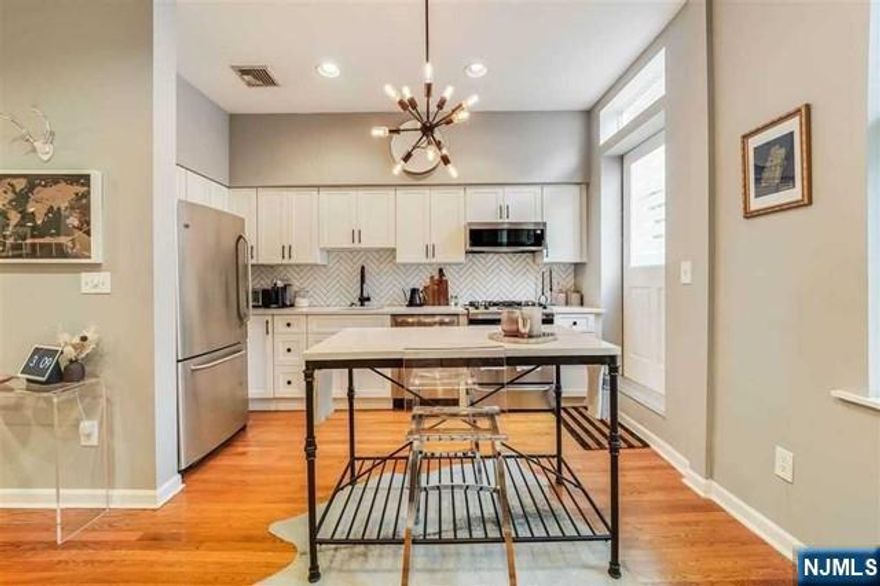 Enjoy living in this downtown apartment in a boutique building of HUDSON STREET in HOBOKEN. This East Facing one bedroom with double closets includes in-unit washer/dryer, an attached private deck for outdoor entertaining, central A/C, intercom, and a spacious storage locker in the basement. The modern kitchen features granite countertops, S/S appliances, and an open concept living room, with hardwood floors and recessed lighting throughout. Dogs extra pay $50 per mo. steps to the River Walk Path, Parks, Shops Restaurants, and Fantastic Convenience to the Path Station, and other NYC transportation.