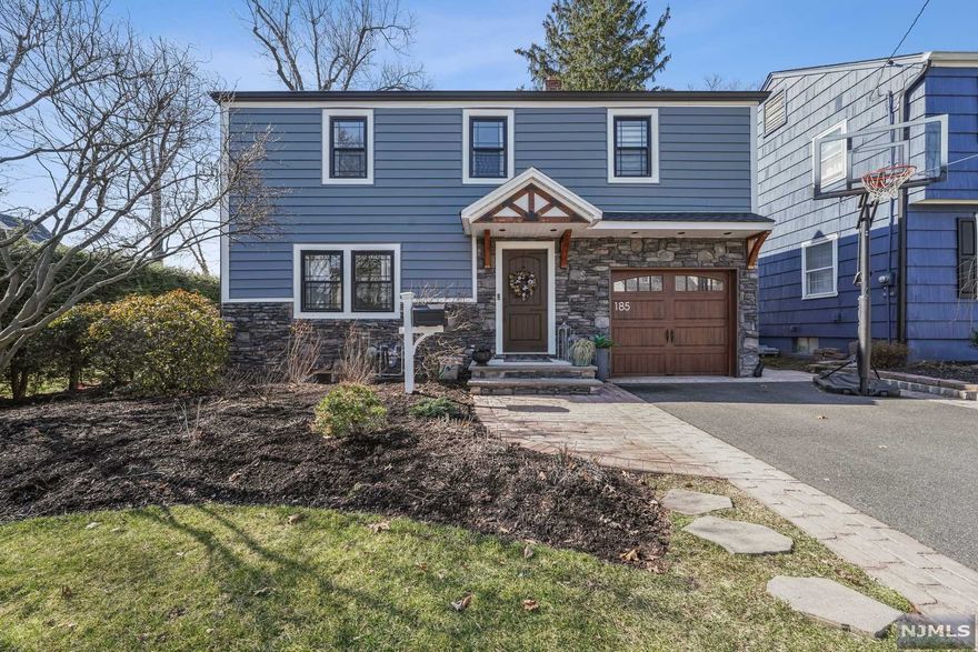 Every opportunity to improve and update has been taken in this beautiful three-bedroom two full bath colonial with updated bathroom, newer siding and stonework, newer windows and doors, updated furnace, water heater, lighting, and paver patio. Located on a quiet street in a desirable neighborhood, this home offers a sense of warmth and comfort found both inside and outside. The first floor is comprised of a spacious living room, dining room, den, full bath and eat-in-kitchen with sliders to the lush and inviting backyard. Finished basement offer a rec room, area for home office and laundry/utility room. The second floor puts forward three spacious bedrooms and a stunning full bathroom. Additional features include hardwood floors, crown molding, and oversized kitchen sink. Truly a special home...nothing to do here but unpack.