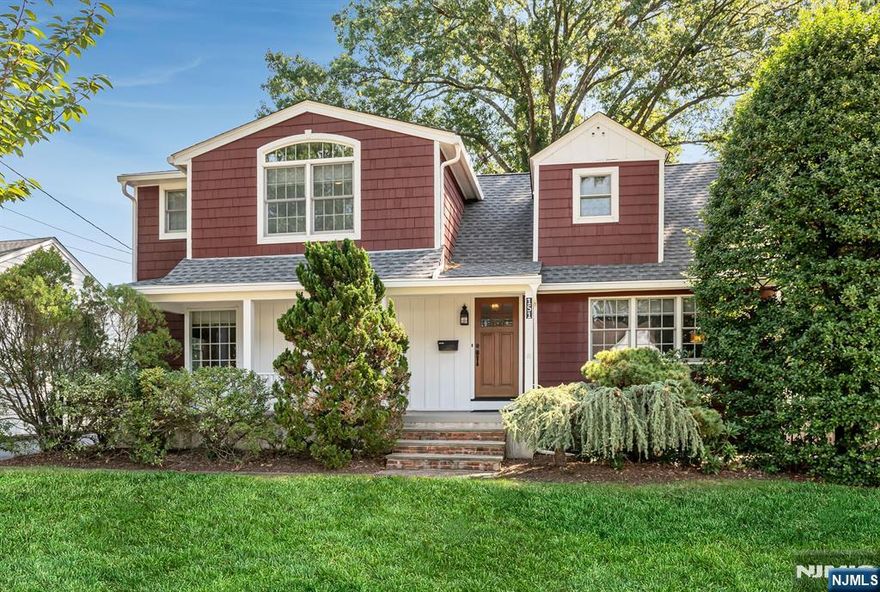 HIGHEST AND BEST OFFERS REQUESTED BY WED. SEPT. 24 AT 12:00 PM. Welcome to this classic 4-bedroom, 2.5-bath Colonial with lemonade porch set on a generous 100â€™ x 140â€™ flat, level lot. With over 2,400 square feet of living space and room to expand, this home offers the perfect blend of charm, comfort, and potential. The spacious kitchen features a center island, breakfast room, and easy flow into the light-filled family room, where French doors open to a newer Trex deckâ€”ideal for entertaining or relaxing outdoors. A first-floor powder room and a laundry/mudroom add everyday convenience, while the formal living and dining rooms provide plenty of space for gatherings. Upstairs, the primary bedroom includes a full bath, and three additional bedrooms share a renovated hall bath. The property also offers a two-car detached garage, fully-fenced backyard, and large storage shed, perfect for a future workshop, home gym, or creative studio. The partially finished basement offers more potential for additional living space. New roof (2021), 200 amp electric, and central air. Conveniently located close to schools, parks, shopping, and transportation. Move right in and enjoy all that Ridgewood has to offer!