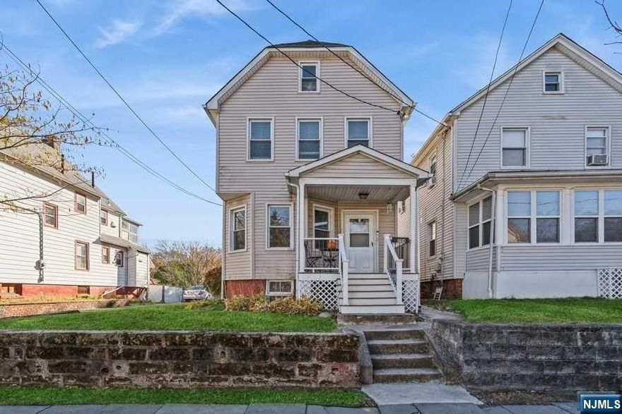 Recently updated 3 bedroom colonial with large yard. Updates include new gas heating system, new deck for outdoor entertaining, bathrooms and more. Featuring huge modern eat-in kitchen and 2 handicapped accessible full baths. Close to NYC bus and train, shopping, and parks. Finishable basement with plumbing for a third bathroom and outside entrance. This home is NOT in a flood zone.