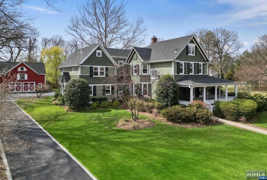 Spectacular restored and expanded turn-of-the century Victorian sitting on one of Oradell's most desirable streets. This 9100 sf beauty (multiple floors) offers a unique experience with countless vignettes for any occasion. With 7 br's, 7 bths, and a luxe primary suite, the timeless design balances modern living with old-world charm. The 1st fl guest suite rivals a Manhattan penthouse. The chef's kit opens to a cozy fam rm, outdoor living space w/kit and stone fpl perfect for al fresco dining! Work from home in the spectacular 2nd fl office w/balcony. Movie nite in the LL media rm and fam rm w/wine wall. The restored barn features a 2-1/2 car garage, a gym w/soaring ceilings and reclaimed barn wood walls. Adjoined by 1.5 acres of passive parkland, impeccable landscaping w/up-lighting and mature trees on a serene .67 acre lot. Oradell has a charming downtown, tree-lined streets, parks, classic architecture and the nearby train station for easy access to Manhattan. Truly perfect!