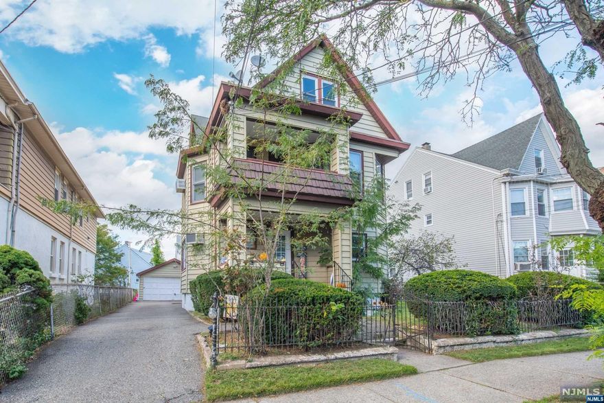 Welcome to this exceptional 2-family home that promises comfort, convenience, and investment potential. The first floor welcomes you with hardwood floors, a spacious kitchen, a cozy living room, and three bedrooms & bathroom. Tenants on this level also have access to the basement, perfect for storage. The second floor mirrors the first, offering a similar layout and comfort. Both units feature washer/dryer hookups in the basement. Additionally, this property comes with a 2-car garage, providing secure parking and rental income opportunities. Located in a prime area, this home is close to shopping centers and public transportation, enhancing its appeal for residents. Don't miss the chance to invest in this versatile property; schedule a viewing today!