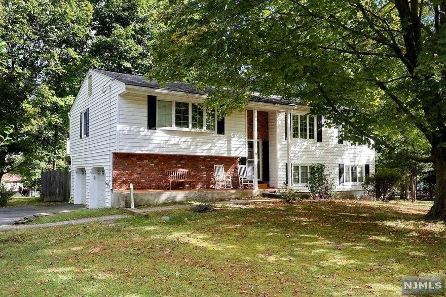 Welcome to this spacious 5 bedroom, 3 bathroom Bi-Level home located on .86 acre of flat property. Sold by the original owner this home offers endless possibilities. Many rooms have crown molding and hardwood floors. Enjoy all that Mahwah has to offer: top-rated schools, LOW taxes, close to NYC commute, shopping, skiing, golf and lakes. Being sold in "as is" condition.