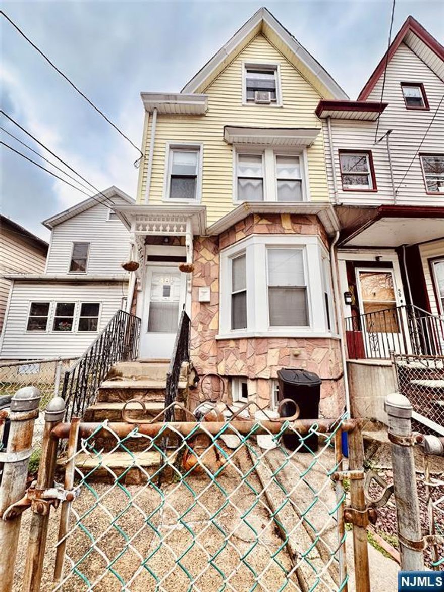 Don't miss this beautiful, recently renovated 4-story townhome featuring private parking, hardwood floors, and two-zoned central A/C to name a few! The main level boasts an airy open-concept layout that quickly invites you in. On the 1st floor alone, this unique residence features an open-concept kitchen and living room, bedroom and full bath complete with a dedicated rear exit/entrance to private 2-car parking and dead-end street to drive in and out of. The second floor offers two spacious bedrooms and a large full bath. And, just in case you need more privacy, ascend to the third floor to find a massive bedroom along with a versatile den/office area and extra storage space turned into a generous, walk-in closet. Speaking of space. Need more? Well, weâ€™ve got you covered. Once zoned as a non-confirming 2-family, the basement offers a bonus living space and serves as a private guest suite with its own full bath, kitchenette and private entrance leading directly to the front. Be the next to experience comfortable living in this stunning townhome in a wonderful, North Newark location near Branch Brook Park, colleges, hospitals, the airport and more.