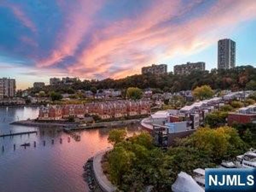 THE 2ND LARGEST MODEL IN THE COMPLEX! SPECTACULAR MULTI-LEVEL TOWNHOME LOCATED ON EDGEWATER'S GOLD COAST!! APPROX. 4200 SF WITH AN OPEN FLOOR PLAN AND A FULL BASEMENT BONUS LEVEL-NOT INCLUDED IN THE SF. OFFERING A ROOFTOP DECK INCLUDING WATER, ELECTRIC, GAS FOR ALL YOUR GRILLING NEEDS AND AN ENCLOSED GLASS SOLARIUM. A PRIVATE FULL-SIZE ELEVATOR, BRIGHT ROOMS WITH FLOOR TO CEILING WINDOWS, HARDWOOD FLOORS AND RADIANT HEAT THROUGHOUT, CENTRAL VACUUM, 2 STEAM SHOWERS, 2 JACUZZI TUBS, STATE-OF THE ART KITCHEN WITH SUB-ZERO REFRIGERATOR AND GRANITE COUNTER TOPS, 4 BEDROOMS, 4.5 BATHROOMS, MULTI-BALCONIES, PRIVATE 2 CAR GARAGE-PLUS 2 DRIVEWAY SPACES. OFFERING LUXURY LIVING AT IT'S BEST! BEAUTIFUL NORTH, SOUTH, EAST RIVER AND NYC VIEWS. STEPS TO A BEAUTIFUL POOL THAT LOOKS OUT TO THE MANHATTAN SKYLINE. NEXT TO A MARINA'S FOR ALL YOUR BOATING NEEDS. MINUTES TO THE EDGEWATER/NYC FERRY & GW-BRIDGE, VERY CLOSE TO SHOPPING, TRANSPORTATION & RESTAURANTS! IT'S AN ABSOLUTELY BREATHTAKING UNIT! COME PREVIEW!