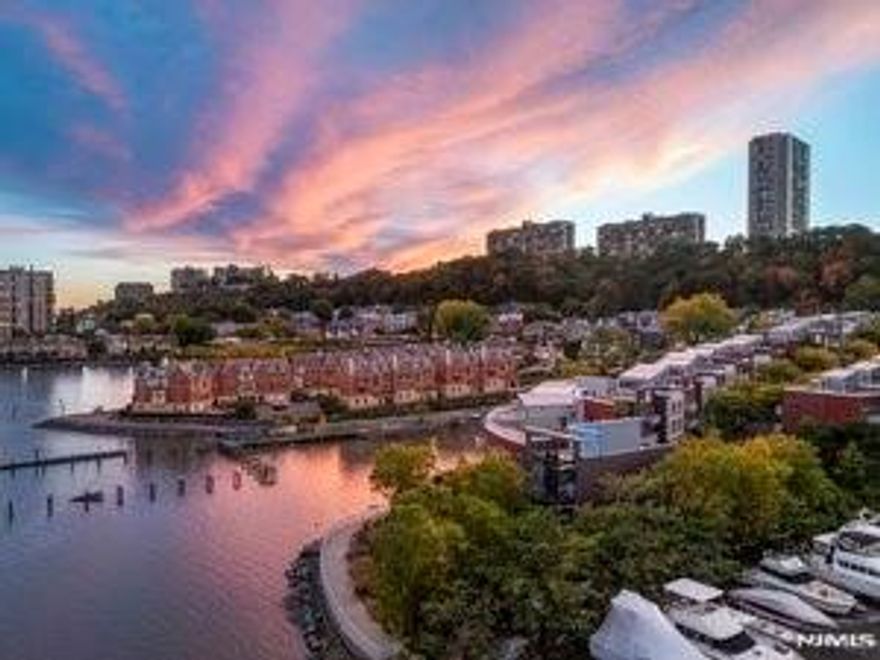 THE 2ND LARGEST MODEL IN THE COMPLEX! SPECTACULAR MULTI-LEVEL TOWNHOME LOCATED ON EDGEWATER'S GOLD COAST!! APPROX. 4200 SF WITH AN OPEN FLOOR PLAN AND A FULL BASEMENT BONUS LEVEL-NOT INCLUDED IN THE SF. OFFERING A ROOFTOP DECK INCLUDING WATER, ELECTRIC, GAS FOR ALL YOUR GRILLING NEEDS AND AN ENCLOSED GLASS SOLARIUM. A PRIVATE FULL-SIZE ELEVATOR, BRIGHT ROOMS WITH FLOOR TO CEILING WINDOWS, HARDWOOD FLOORS AND RADIANT HEAT THROUGHOUT, CENTRAL VACUUM, 2 STEAM SHOWERS, 2 JACUZZI TUBS, STATE-OF THE ART KITCHEN WITH SUB-ZERO REFRIGERATOR AND GRANITE COUNTER TOPS, 4 BEDROOMS, 4.5 BATHROOMS, MULTI-BALCONIES, PRIVATE 2 CAR GARAGE-PLUS 2 DRIVEWAY SPACES. OFFERING LUXURY LIVING AT IT'S BEST! BEAUTIFUL NORTH, SOUTH, EAST RIVER AND NYC VIEWS. STEPS TO A BEAUTIFUL POOL THAT LOOKS OUT TO THE MANHATTAN SKYLINE. NEXT TO A MARINA'S FOR ALL YOUR BOATING NEEDS. MINUTES TO THE EDGEWATER/NYC FERRY & GW-BRIDGE, VERY CLOSE TO SHOPPING, TRANSPORTATION & RESTAURANTS! IT'S AN ABSOLUTELY BREATHTAKING UNIT! COME PREVIEW!