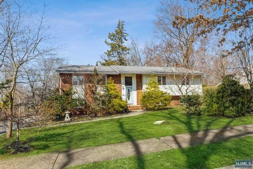 Fabulous location for this bright sunny bi-level in a cul de sac! Put your finishing touches on this freshly painted home. Oversized 2 car garage and super large deck rounds out this secluded setting.