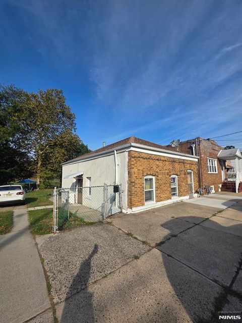 Photo of 243 Gaston Ave, Garfield, NJ 07026 (MLS # 25041430)