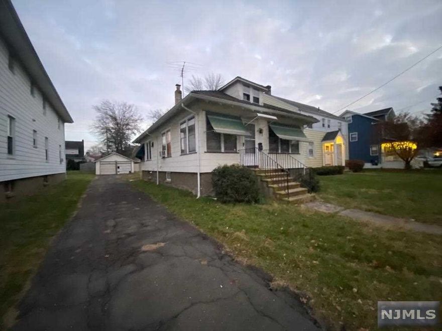 Location, location, location! Come and check out this charming 3 bdrm, 1 bath home in one of the most desired neighborhoods of Little Falls. Large 2-car garage & backyard. Great opportunity to make this home your own with some updating! This home is just minutes away from the train station, bus stops, major highways, and Montclair State University. Perfect for NYC commuters. Only a few houses away from Cedar Grove! CHEAP TAXES & NOT in a flood zone. Being sold strictly AS IS. Seller WILL remove underground oil tank prior to closing. HIGHEST & BEST BY MONDAY 12/06 @ 12 PM.