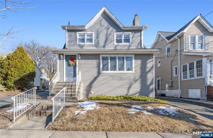 Pride of Homeownership & first time available in 50 years. Two-family home with updates, fenced in property, 2 car detached garage, long driveway for multiple vehicles. First Unit - Living Room, Den, Dining Room, Modern Eat-in Kitchen, Bedroom, Bedroom w/wash basin, full bath, full finished basement w/full bath, laundry & utilities. Baseboard heat w/separate zones, hardwood & parquet flooring. Second Unit - Living Room, Dining Room, Updated Eat-in Kitchen w/stainless steel appliances, Bedroom, Bedroom, full bath. Attic access, lots of closets, central a/c & heating, hardwood flooring & carpeting. Bonus: 2nd unit has stackable washer/dryer at base of stairs going up to the unit. **Seller is looking to coordinate sale of home with purchase of new home** Properly abandoned oil tank w/documentation on property. Chimney/fireplace/flue is AS-IS condition, seller has estimate for lining. Great location - close to park, shopping, stores, major roadways.