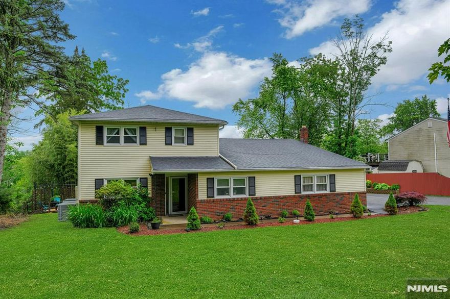 Home is where the heart is and this beautifully maintained split-level truly captures it all. This spacious 4-bedroom, 2.5-bath home offers the perfect blend of comfort, functionality, and style. Step inside to find gleaming hardwood floors that flow throughout the main living areas, adding warmth and timeless charm. The bright and open layout features a large living room and dining area, ideal for both everyday living and entertaining guests. The updated kitchen is equipped with sleek stainless steel appliances, ample cabinet space, and a convenient layout that makes cooking a joy. A versatile first-floor bedroom provides flexible options for a guest room or office. Upstairs, you'll find three generously sized bedrooms and two full baths, including a spacious primary suite with great closet space. Step outside through sliding glass doors onto a lovely deck that overlooks your private backyard perfect for summer barbecues or relaxing evenings outdoors. The real showstopper? Your very own in-ground pool, creating a true backyard oasis where lasting memories will be made. With curb appeal, comfortable spaces, and a layout designed for modern living, this home is one you won't want to miss.