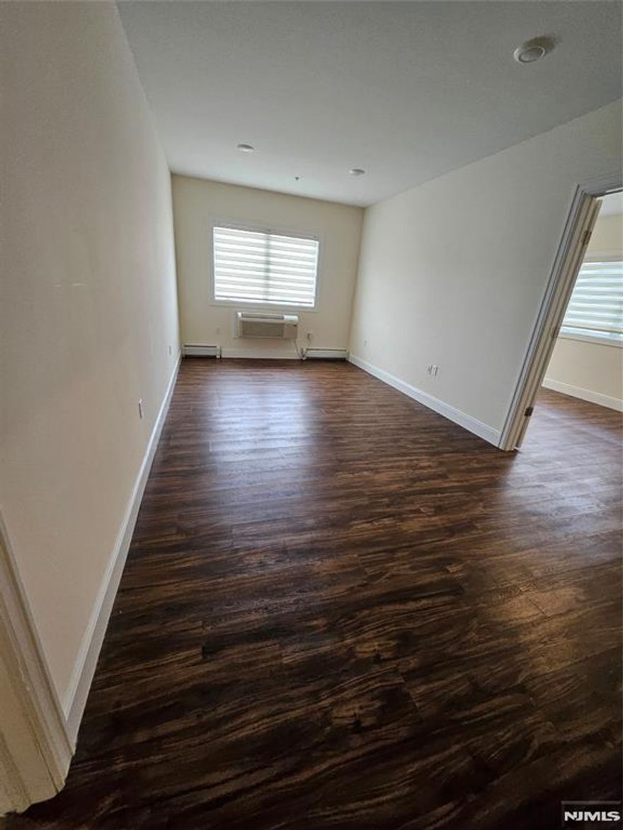 LOVELY 2 BEDROOM/2 BATH IN PALISADES PARK FEATURES A LOVELY GRANITE KITCHEN WITH STAINLESS STEEL APPLIANCES, WOODEN FLOORS THROUGHOUT AND EQUIPPED WITH WASHER AND DRYER. RENT INCLUDES WATER, HOT WATER AND 1 PARKING SPACE. GREAT LOCATION WITH EASY FAST ACCESS TO ROUTE 46, 80, 95 AND THE GWB AND IS WALKING DISTANCE TO MANY SHOPS, RESTAURANTS, CAFE, SPA AND SHOPRITE. $150 MOVE IN FEE AND $350 REFUNDABLE MOVE IN DEPOSIT