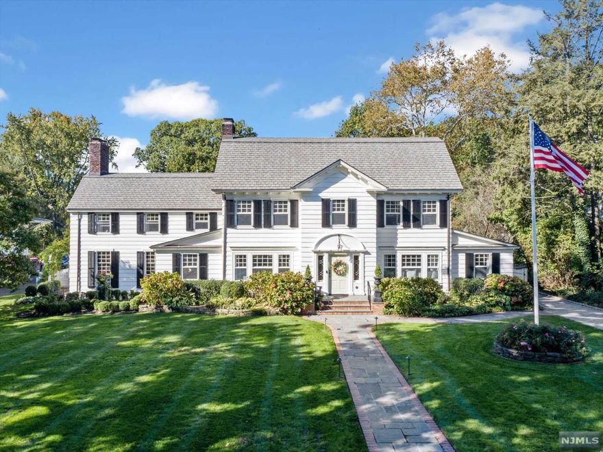 American classic cntr hall Col set on 1 of the lg lots in Glen Ridge. This beaut home w/ ext upgrades & rnvtions throughout & the perfect open flr plan for all to enjoy. The timeless aesthetic offers elegance comb w/modern living. Gour' kit w/ qrtz cntrs, lg isl, Wolf dble ovens & 6-brnr range, Sub Zero fridge plus fridge drawers & 2 wine fridges, btler's pntry & desk, 2 frs, mahogany paneled media rm w/ bar, off, lg dr, lg lr, pr & mud rm compl the 1st fl. 2nd fl feat prim suite w/ oversized bth w/ sking tub, shwr, dble sinks, radiant ht & wic, 4 add't br, 1 w/ensuite bth, & a hbth. 3rd fl has lg br, mrble bth, lndry & lots of storage. 2 bsmnts, 1 w/ outside entr, wine clost, lndry, pr & rec rm, other w/pool rm & deco fpl, bth w/stor. Spec feat incl lots of cust molding, b/i, wndw seats, hardwd flrs, m/z ht/cool, flat yrd w/pergola, blstone patio, grill h/u, fnc, sprink sys. 3-car oversized gar w/loft. Close to Walnut St train station, Farmer's Mrkt, Cafe's, GR top rated schls.