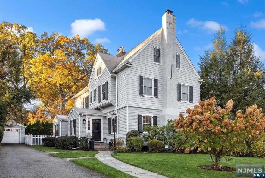 Nestled in the highly sought-after neighborhood of "The Woods" in Upper Montclair, this gracious side hall col presents an exceptional opp. for luxurious living. Boasting proximity to the Up Mtc business district, parks, bus, & NYC direct train, Entering the foyer, you are welcomed by an expansive LR w/ classic accents, built-in shelving, & WBF. The DR, feat. a decorative fpl. The chef's kit boasts Dacor double ovens, an oversized built-in refrig, Thermador burners, & Bosch dishwasher. A FR w/ample storage adjoins the kitchen, perfect flow for hosting & entertaining, w/French doors opening to the backyard for indoor-outdoor enjoyment. Upstairs, 2 lg sized BR & a main BR offers comfort & style. The primary suite features a spacious layout, fpl, dressing rm, & bth w/lots of storage. The 3rd fl has 2 BR & a fbth. The fully fin basement is your rec destination w/ exercise rm & kitchenette. Outside, the landscaped backyard oasis is the scene for memorable gatherings & backyard BBQs.