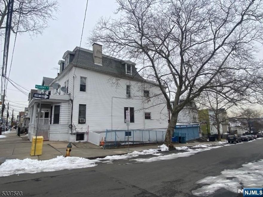 Discover this well-maintained multi-family home on a spacious corner lot. Each unit offers two bedrooms, a full bath, kitchen, and living room. Highlights include low taxes and a large four-door garage for ample vehicle and tool storage. Ideal for investors or multi-generational living, located in a convenient area with up-to-date maintenance. A smart buy with great potential!