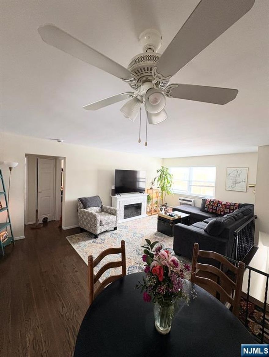 Beautiful 2-bedroom, 1-bath condo in a prime Ramsey location. This condo offers a private entrance, dedicated parking, and an open-concept living and dining area with hardwood floors throughout. The sun-filled kitchen features excellent natural light, abundant cabinet space, and a convenient seating area ideal for casual dining, with appliances including a refrigerator, range/oven, and dishwasher. Both bedrooms are spacious and well-proportioned, offering comfortable living and storage flexibility. In-unit laundry, heat and hot water included, and through-the-wall A/C units provide year-round comfort. Ideally located near major highways, NJ Transit train station, and bus routes, with shopping and dining nearby.