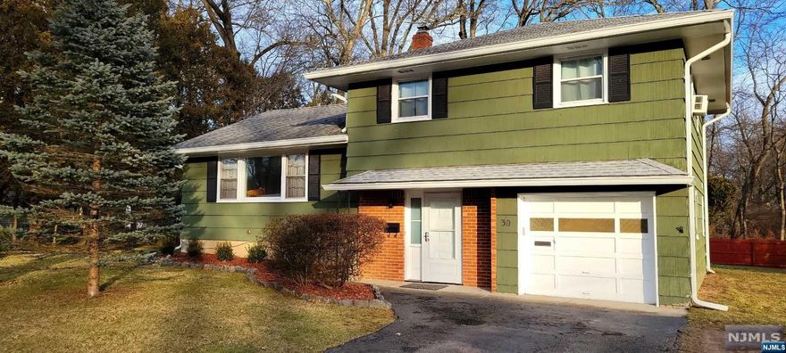 Well maintained sugar maple split level home on a great street in Waldwick. Large 105x157 level property with patio. Owner converted 2 bedrooms into one big bedroom with walk in closet. Can easily be converted back to 2 bedrooms. Nice size primary bedroom with half bath and 2 double closets. Ground level family room with sliding glass doors to patio and backyard. Laundry room and half bath and entrance to garage on ground level. Finished basement with storage closets. Wood flooring, great street...OPEN HOUSE 2/19 1-3. AGENTS MUST ACCOMPANY THEIR CLIENTS TO OPEN HOUSE, NO EXCEPTIONS.