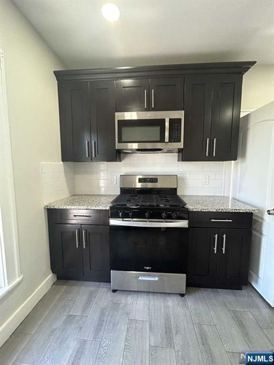 Enjoy spacious living in this beautifully updated upstairs unit featuring 3 bedrooms and 1 bathroom. Highlights include a modern kitchen, cozy living area, and ample natural light throughout. Conveniently located in a quiet neighborhood, close to shops, schools, and public transportation. Laundry hookups in-unit. Dogs allowed for $50/month per dog. Tenant is responsible for all utilities. Background report, credit check & proof of income are required. $50 per dog per month. Backyard is for the 1st floor tenant but willing to share