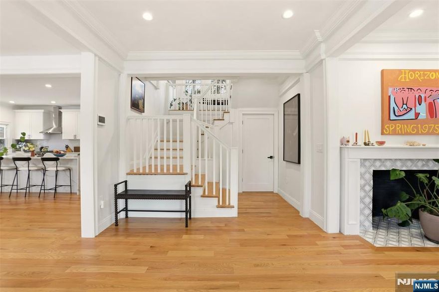 In Seven Oaks, scale matters. Proportion matters. Presence matters. 403 Lawn Ridge delivers all three. Set on one of the neighborhoodâ€™s most established streets, this fully reimagined Colonial offers 3,527 square feet of living space across six bedrooms and four full baths, a layout defined by generous proportions and thoughtful flow. The architecture is classic and composed. The renovation preserves the homeâ€™s historic integrity while introducing refined, modern updates throughout. Formal and informal spaces are intentionally defined, allowing natural light to move seamlessly from room to room. The kitchen serves as a functional and elegant centerpiece, opening to gathering areas designed for both everyday living and entertaining. Upstairs, six well-scaled bedrooms provide flexibility of use, complemented by four full baths finished with timeless detail. The result is a balanced restoration, original character remains intact, while contemporary enhancements elevate comfort and efficiency. Located in the coveted Seven Oaks section near the South Orange border, the property enjoys proximity to South Orange Village, tree-lined streets, distinguished architecture, and convenient Midtown Direct train service to Manhattan. 403 Lawn Ridge offers architectural grounding, modern refinement, and enduring presence within one of the areaâ€™s most established neighborhoods.