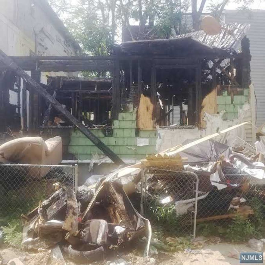 Single family/BLOCK# 03417 & LOT# 00003 25X45 in R3 ZONE major FIRE DAMAGE being SOLD "AS IS"great builder/investor opportunity.