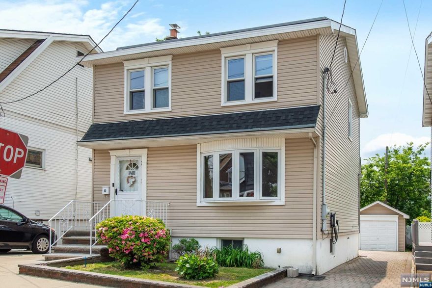 Look no further! This move-in ready 3 bedroom, 2 bath Colonial home in the popular town of North Bergen is completely turn-key. First floor features a spacious living room with gorgeous molding and woodwork throughout, a dining room, family room, full bathroom, and kitchen with brand new appliances. Upstairs has 3 bedrooms, plenty of closet space, and an additional full renovated bathroom. Spacious basement with so much potential, ample parking, manicured lawn and backyard, and 1 car garage! Best of all, pay very low utility bills with the solar panels installed through TESLA and benefit from the installed electric car charger! This home is not only modern but located within close proximity to parks, schools, and NYC transit. All offers from buyers will be considered. Will not last- make your appointment today!