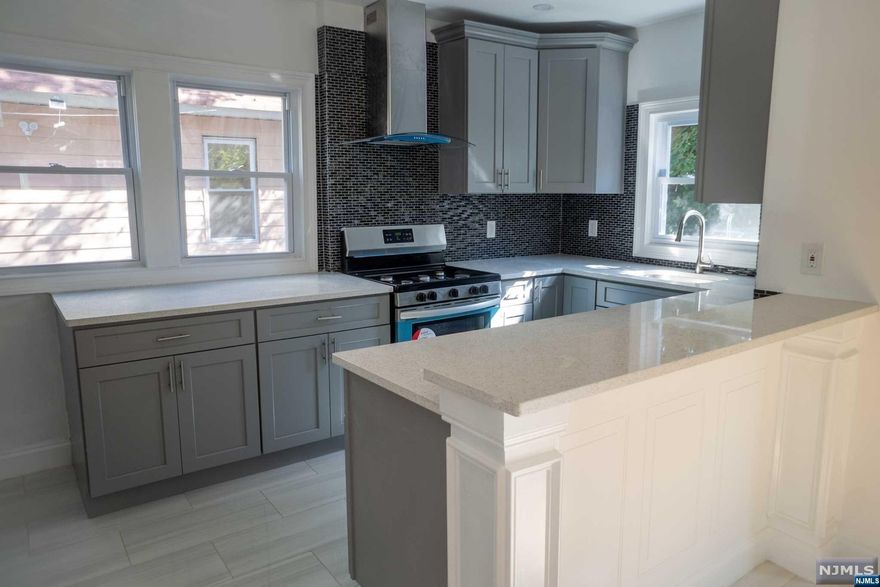 COMING SOON! Welcome home to this beautifully renovated Cape. Upon entering you have a enclosed porch/mudroom. All new flooring throughout the home. Fully refinished with a brand new kitchen including appliances. First floor also features a sun filled demand a full bath. All bedrooms privately located upstairs with a renovated full bath. Bonus finished can provide many uses. Separate side entrance to partially finished basement includes washer/dryer hook-up. Driveway fits upto 3 cars with detached garage.