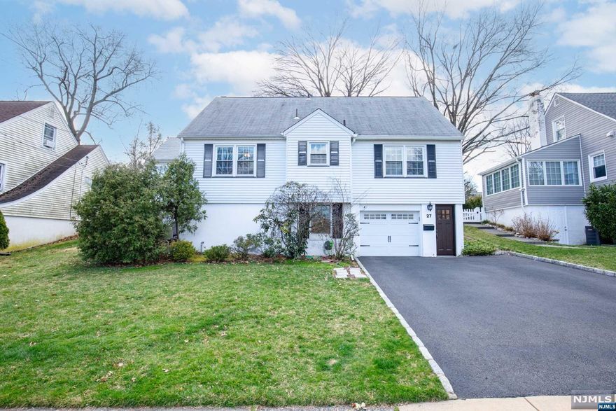 For more information on this home please contact Benny Abramov- 201-747-0564. Come and enjoy all that historic Radburn has to offer- waking path, pools, tennis and so much more. Welcome to this true pride of ownership four-bedroom home! Enter into the glistening hardwood floored foyer that opens to the formal living room with fireplace. Across from the formal dining room sits the kitchen with custom cabinets, tile floors, glass backsplash, SS appliances and wraparound granite tops. There are two bedrooms along with an updated full bath. The fabulous windowed sunroom opens to the paver patio and manageable yard that leads to the walking path. The upper level features a primary bedroom, a fourth bedroom, and a full bath. The ground level with garage has a pristine entertainment / utility / laundry room. Be part of Radburn - enjoy the free programs, community center, theatre group, exercise classes and so much more. Close to NYC transportation and shopping!