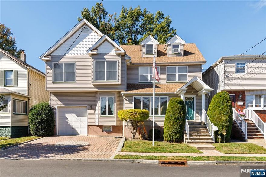 More than a home, this Custom Colonial, fully renovated in 2000-01, will take your breath away. As you walk in through the beautiful Foyer, the sheer size of the main floor will astound you. The large open layout greets you with an inviting dining area just waiting to entertain you and your guests. Then, get cozy in the beautiful large living room with sliding doors to the deck for plenty of natural sunlight and leading to the above ground pool. Finishing off this open layout, behold a gorgeous eat in kitchen with a dreamy center island. From the dining room the stairs will lead you to the second floor where all of the perfect accommodations await you. The master suite, consisting of a huge bedroom with plenty of closet space and breathtaking bathroom will certainly surprise you. 4 additional bedrooms of ample size, a full bathroom and a laundry area make this the perfect space. But that's not all! Large attached garage with tons of extra space, 2 parking spaces outside of the garage, a large basement with a family room and an office/exercise room and a finished room on the third floor along with tons of additional storage space add the finishing touches to an already perfect home.