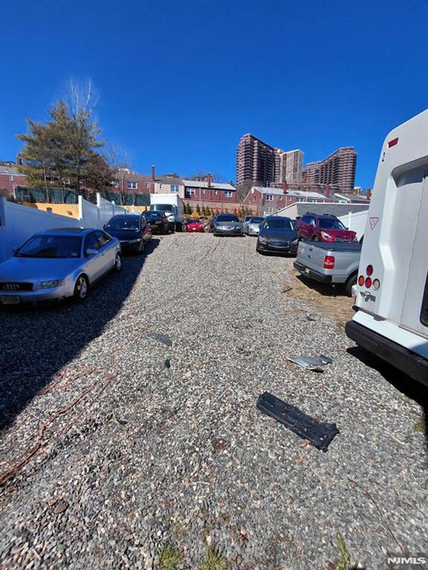 Large lot for development available in Edgewater. This 11,395 square foot lot also has a mixed use building on it that consists of a leased out 3 bedroom apartment for which the owner receives $3500.00 per month. The apartment was fully renovated in 2023. The owner has a commercial space on the ground floor and uses the large back area of the property for impounded cars. This lot is ripe for development being in the heart of the ever changing Borough of Edgewater.