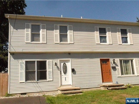 Photo of 528 Chestnut Pl, Teaneck, NJ 07666 (MLS # 26033498)