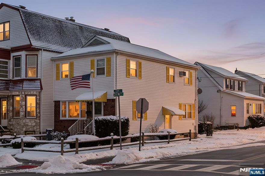 An exceptional 3-bedroom Colonial, beautifully positioned on an expansive corner lot just steps from the energy of downtown North Arlington. This inviting yet sophisticated home blends timeless character with modern comfort, offering effortless access to NJ Transit, renowned dining, and shopping. Sun-filled interiors showcase gleaming hardwood floors, an elegant formal dining room, and a chef-inspired eat-in kitchen with newer appliances and a stainless steel double ovenâ€”perfect for both everyday living and elevated entertaining. The finished basement with bonus room and stylish bar creates a seamless extension of the living space, ideal for hosting unforgettable gatherings or enjoying quiet evenings at home. Outdoors, a private backyard retreat with deck invites al fresco dining and relaxation, while off-street parking adds everyday convenience. A rare opportunity to own a home that delivers charm, lifestyle, and location in perfect harmony.