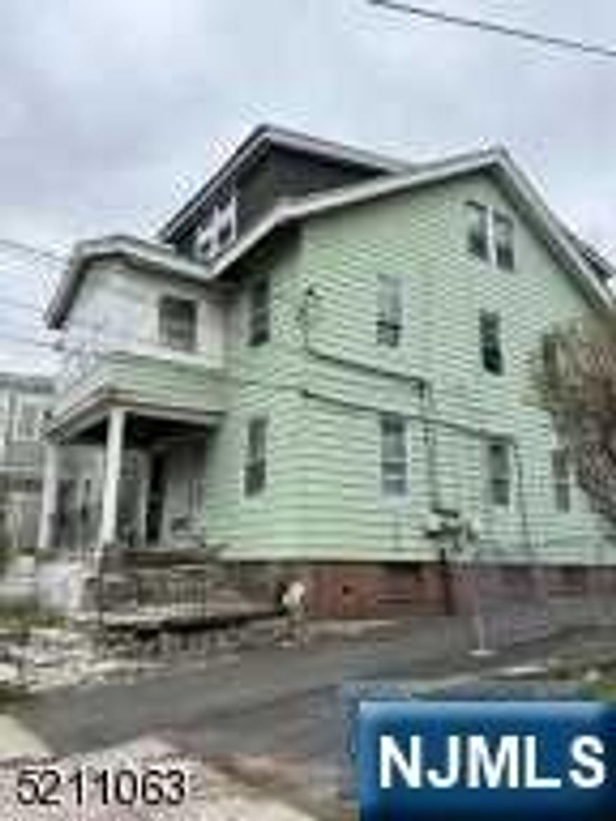 Three family house in need of rehab, 5/5/3 drivewary and nice size yard. Cash or hard money. Buyer responsible for all city & state inspections, C/O and Fire and repairs