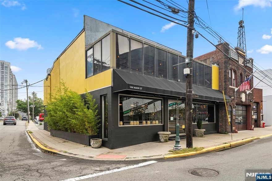 Prime investment opportunity located in a busy commercial district. This restaurant property features an open plan with exposed brick walls, two stories, and 50 ft frontage on Main Street. Currently operating as a restaurant. The property includes 4 on-site parking spaces, sits on a 0.12-acre lot, and is zoned C1. Built in 1984, this single-tenant building offers strong visibility and potential in a vibrant commercial area.