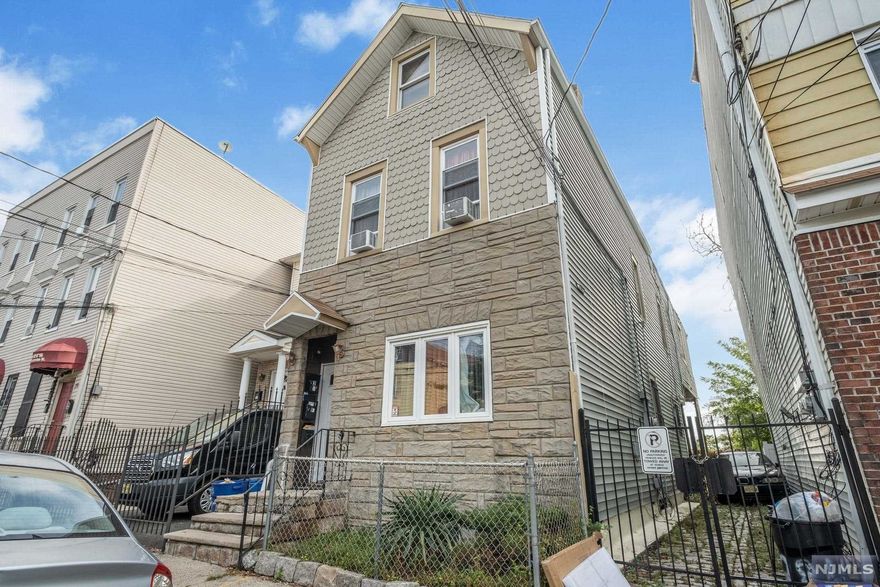 Great opportunity to own this well maintained income producing and recently updated 2 family house in the Springfield-Belmont neighborhood. New updates include - New Boiler (2021), New Hot Water Heater (2021), New Roof (2021), New Flooring on 1st floor (2020), New Windows (2020). Studio unit in the back of the house for potential extra income. 1st floor rent is $1,400/month. Floor 2 will be delivered vacant.