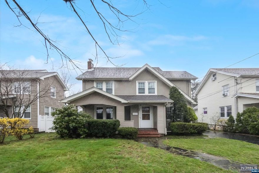 Welcome to this great colonial style home in Teaneck. As you walk into the house you will see a large living room with a wood burning fireplace, a great size living room, a den area, a spacious eat in kitchen, and a powder room. On the second floor you will find three bedrooms and a full bathroom. The attic is also finished and can be used as an office or flex space. The basement is unfinished, with lots of storage space, laundry and full bathroom. Additional features include hardwood floors throughout the 1st & 2nd floor, a long driveway, and a great front porch.