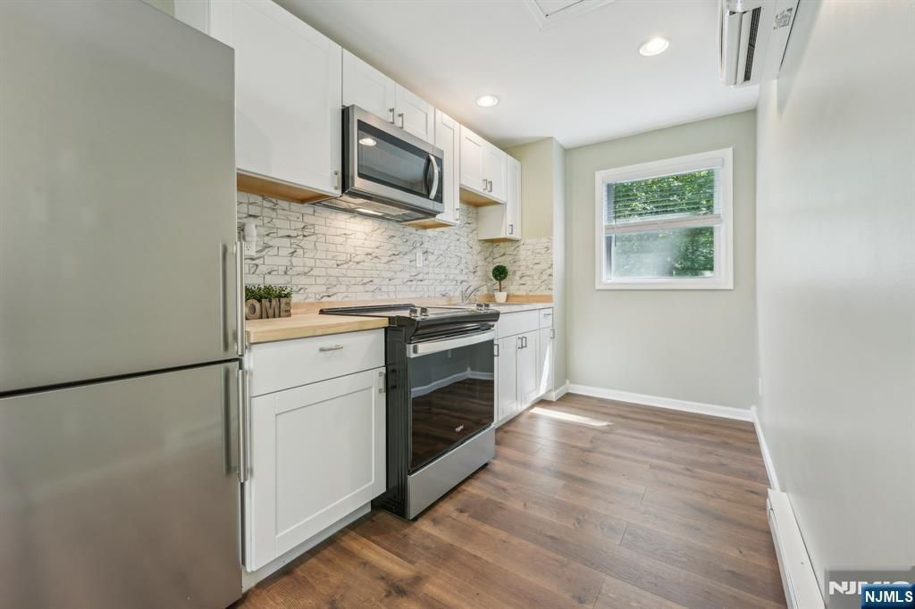 Photo of 57 Riverlawn Drive, Wayne, NJ 07470 (MLS # 25041651)