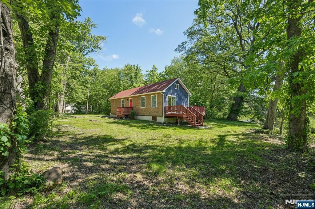 Photo of 57 Riverlawn Drive, Wayne, NJ 07470 (MLS # 25041651)