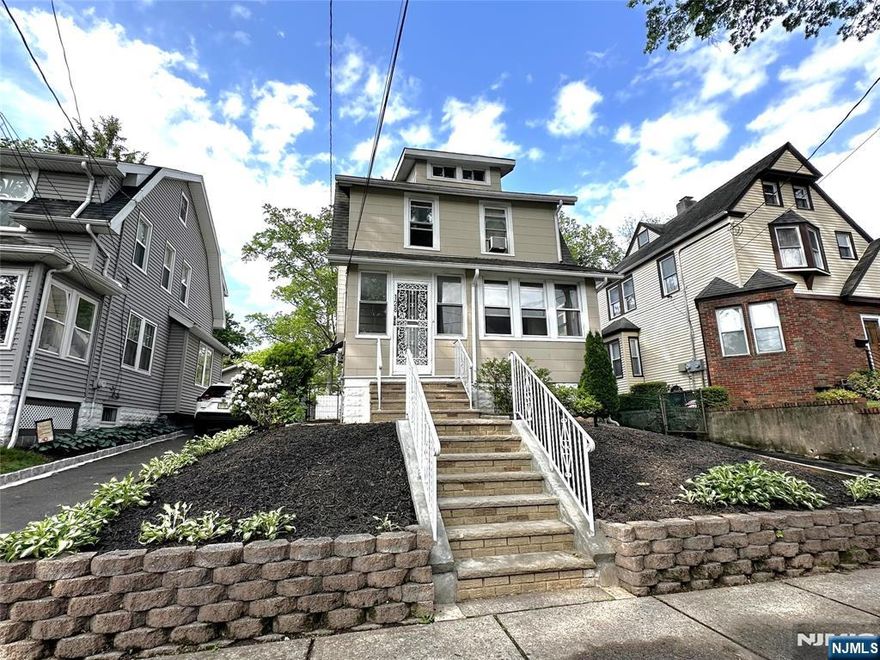 Wonderful 3 bedroom Colonial located on a quiet neighborhood tree lined street. This is Home! Many great features include spacious living room w/ adjoining sitting area, formal dining room, modern kitchen w/ skylight. Second floor 3 bedrooms, 1 full bath The enclosed front porch & finished walk up attic are a bonus! Finished basement w/ full bath. Short distance away from Nutley's vibrant shops, restaurants & Yanticaw Park. Conveniently located near highways, NJ Transit. Short distance to NYC