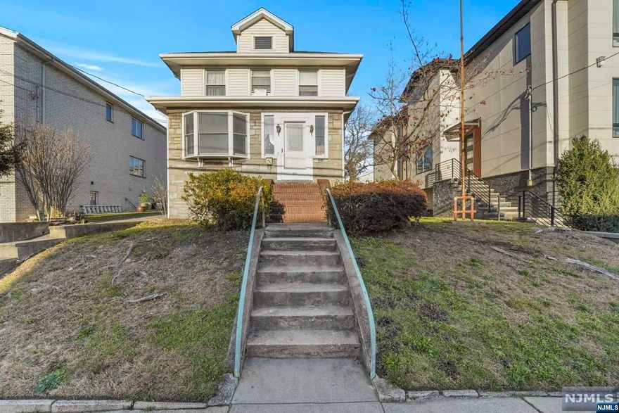 Discover the hidden potential of this fixer-upper, a true diamond in the rough waiting to be polished. With it's abundant land-square footage (approximately 5001 sq. ft.), it also offers the versatility to create your dream home or even a duplex, all in a quiet yet conveniently accessible location. Unleash your creativity; the possibilities are endless!