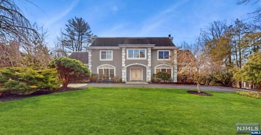 It's a stylish and welcoming home located in the coveted neighborhood of Short Hills. Entering the main floor, a high ceiling entry foyer with stunning Chandelier and staircases, formal living room with double-side fire place and wet bar; formal dining room with fire place; two powder rooms; family room/Library with beautiful wood shelf; masterful culinary kitchen with a breakfast area, command center, double sinks, high-end SS appliances(subzero fridge, Viking range, Bosch dishwasher, wine cooler, Deco double oven), granite counter top, crisp white cabinet; butler pantry; laundry room. The second level of living space includes master suite with two WIC, two full bath, siting area, large balcony facing the old short hills garden and green wood garden, enjoy the picturesque view everyday. Three additional spacious bedrooms, one en suite with full bath, the other two sharing a jack-and-jill bath and each have it's own WIC.