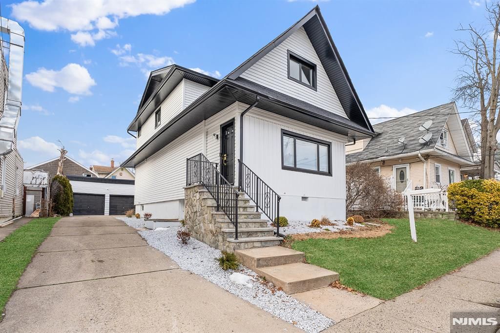 Photo of 290 Queen Anne Road, Teaneck, NJ 07666 (MLS # 26000779)