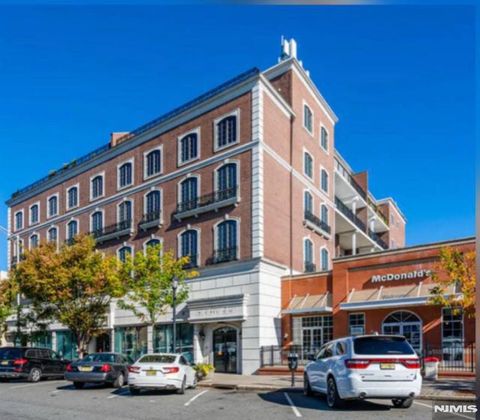 Photo of 53 W Palisade #406, Englewood, NJ 07631 (MLS # 26010944)