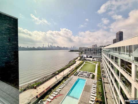 Photo of 9 Somerset Lane #PH 608/614, Edgewater, NJ 07020 (MLS # 26031314)