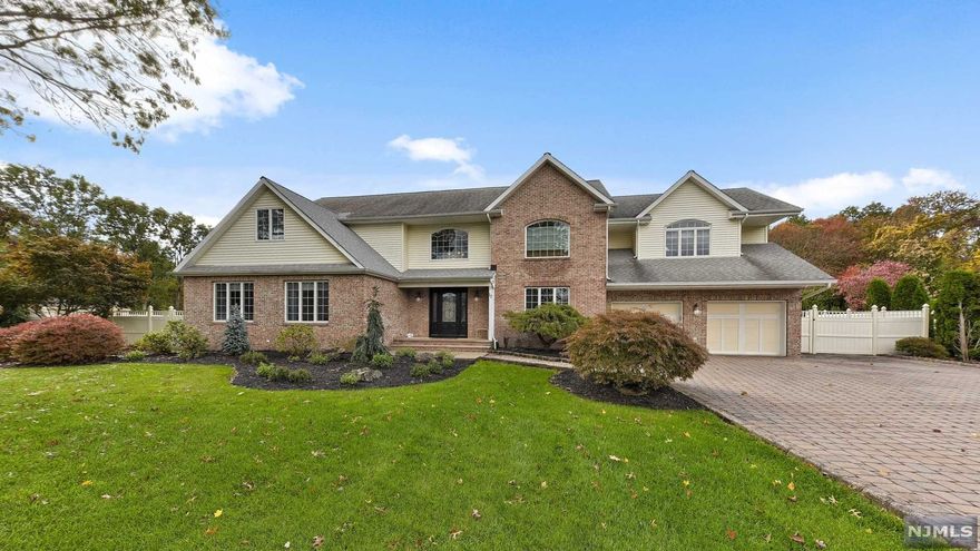 Rare find in Pompton Plains, approx. 5,333 sq. ft Custom Colonial sitting on the end of the Cul de Sac. Exquisite entry leads to the foyer. FLR w/2nd foyer & office, FDR w/adjacent Butler's Pantry.Massive Custom Kit w Granite Counters.Convection Oven plus Double Ovens. Oversized Refrigerator. Sliders to deck and entry to rear foyer and Laundry Rm, Garages and 2nd fl open staircase to the Great Room. Breakfast Rm w/desk and built-in buffet. FR w/gas fireplace. Rear open staircase leads you to the Great Rm and Exercise area. Inviting Master Bedroom, your dream come true. Private Bath, Sauna, Soaking tub + oversize custom shower w/bench seating. Dressing Closet w/built ins. En-suite Bedroom perfect for guests. Main bath + 2 add't BR's.Full Finished LL w Bar Area, Media/Game Room.Storage & Utilities.Fabulous manicured grounds surround the Lazy "L" Inground Pool, large deck, storage shed and fenced in rear property. Many recent updates to flooring and newly painted and quality features