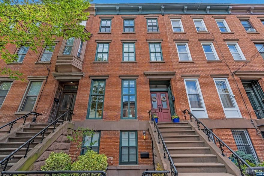 This luxurious home offers sophisticated living in the heart of Downtown JC. This beautifully renovated brownstone features 4 full floors of living with modern amenities & high-end finishes, making it the perfect place to call home. The layout seamlessly flows from the living room to the dining area and kitchen which opens to a gorgeous deck & private backyard oasis, a true extension of living. The second floor features a master bedroom with a large walk-in closet as well as four other spacious bedrooms - each with its own bath & ample closet space. The garden level offers versatility, with the option of using it as a great room, media room, gym, in-law suite or renting it out for additional income. Currently used as a one family home, this is a legal two family. Don't miss your opportunity to own this stunning brownstone in one of the most desirable neighborhoods in Jersey City - schedule your private showing today!
