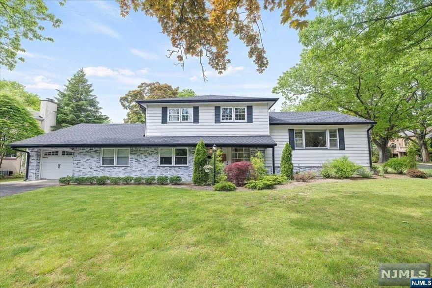 Great opportunity to own a Mother/Daughter house with two separate living areas in the heart of Paramus and walking distance to Midland Elementary school that is nationally recognized, award-winning Blue Ribbon School in Paramus Public School District. House offers 4 bedrooms & 3 baths in a sugar maple split style in a desirable westside location. Perfect house for extended families and adapted with handicap shower and renovated kitchen w/door to yard and separate entrance. Close to town pool, library, schools, Garden State Plaza mall, Bergen town outlet mall, Palisade mall and NYC transportation