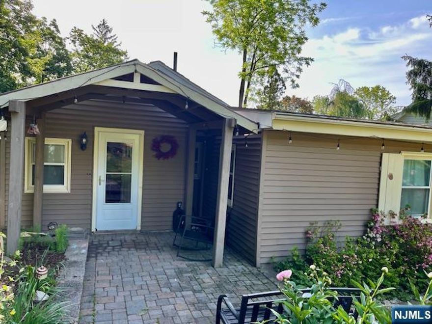 Hidden Gem â€“ Move-In Ready 3-Bed Ranch! Donâ€™t miss this rare opportunity! Nestled in a serene, private setting, this beautifully maintained 3-bedroom ranch offers the perfect blend of peace and convenience. Step into an open-concept layout with vaulted ceilings, laminate wood floors, and sun-filled spaces. The living room flows seamlessly into a bright dining area into the great room and out to a large deckâ€”ideal for entertaining or relaxing while taking in the stunning garden views. The spacious master bedroom offers plenty of natural light, while two additional bedrooms and a full bath offer flexible options for guests, a home office, or other lifestyle needs. Ample closet space throughout! All this privacy yet walking distance to schools and just minutes from shopping, highways, and public transit. Properties like this donâ€™t lastâ€”schedule your showing today!