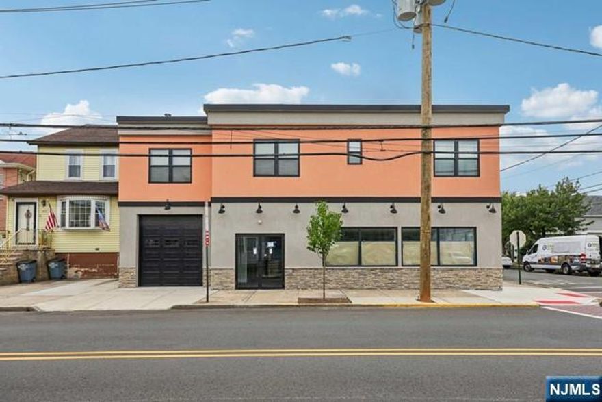 Introducing this expansive mixed-use property located at 315 Centre Avenue, Secaucus, NJ. The first floor offers a 2,300 sq. ft. vacant commercial space, perfect for a small restaurant or deli. The second floor includes an office and two leased residential units, each with separate utility meters for tenant convenience. Situated on a 5,000 sq. ft. lot, the property features a front garage for the commercial space and four parking spaces at the rear, providing ample room for both residential and commercial use!