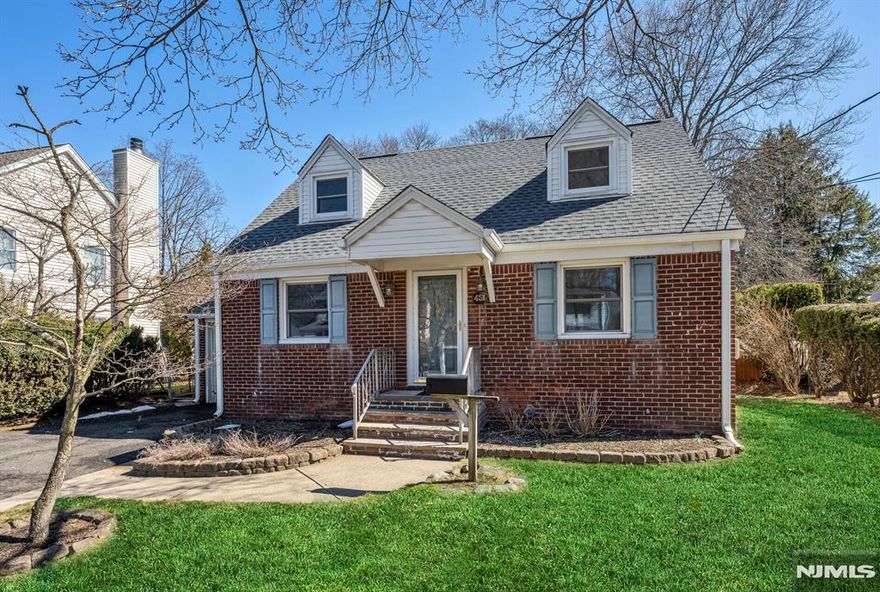 Welcome to this beautifully maintained and freshly painted 3-bedroom, 2-bath expanded Cape, situated on a 60â€™ x 120â€™ lot in the heart of New Milford. The main level features a bright, sun-filled living room with unique ceiling windows that create an open and airy feel throughout the day. The semi-open kitchen with a dedicated breakfast area offers a comfortable layout that flows well for everyday living. An expanded family and dining area adds warmth with a cozy wood-burning stove, skylight, and sliding glass doors that lead to a peaceful 3-season porch, a custom redwood deck, and a fully fenced backyard with a storage shed. The home also offers great flexibility with a spacious first-floor primary suite, large enough to include a home office or allow for a possible bathroom expansion. The second floor includes two additional bedrooms and a full bath, while the finished basement provides a recreation room, laundry area, and ample storage. Major updates include a new roof, newer boiler, and an updated HVAC system with central air and gas heat. Conveniently located within walking distance to the high school and local grocery stores, and offering easy access to the River Edge train station for commuting to New York City. 2025 property taxes are $12,271.