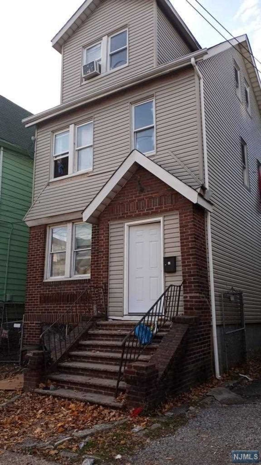Investment Opportunity knocks!! Two Family being sold As is- First floor is 2 bedroom, 1 Full Bath and the upstairs unit on top two floors is 4 Bedroom, 1 Full Bath. Great investment